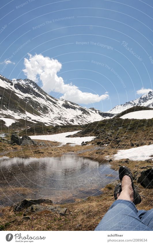 Watching the cloud worm Human being Legs Feet 1 Environment Nature Landscape Sky Clouds Beautiful weather Snow Rock Alps Mountain Peak Snowcapped peak Pond Lake