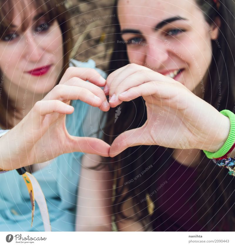 Two friends making a heart with their hands Lifestyle Style Joy Healthy Wellness Harmonious Human being Feminine Young woman Youth (Young adults) Sister