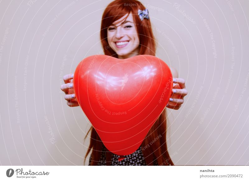 Young woman holding a red heart shaped balloon Lifestyle Joy Beautiful Feasts & Celebrations Valentine's Day Mother's Day Human being Feminine