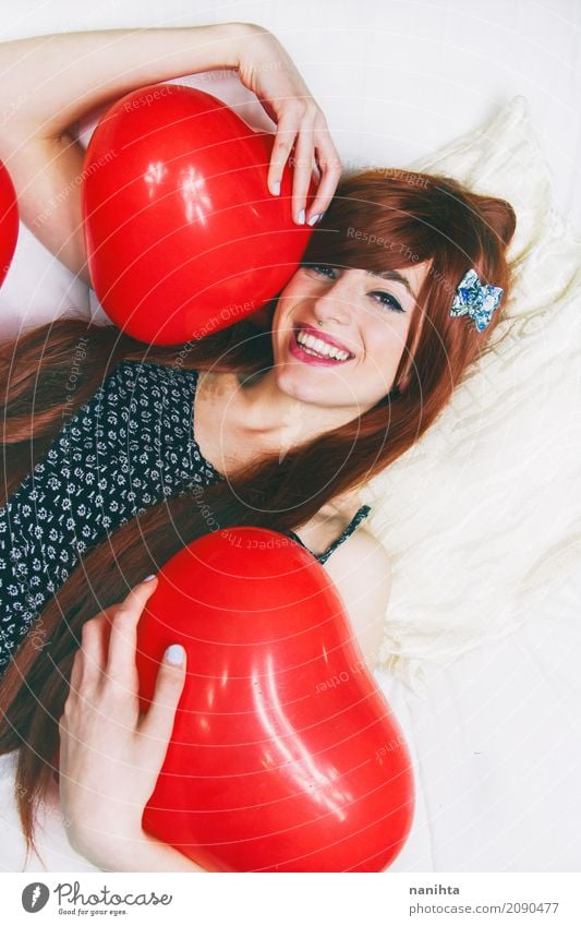 Young redhead woman hugging red heart shaped balloons Lifestyle Beautiful Wellness Well-being Party Event Valentine's Day Human being Feminine Young woman