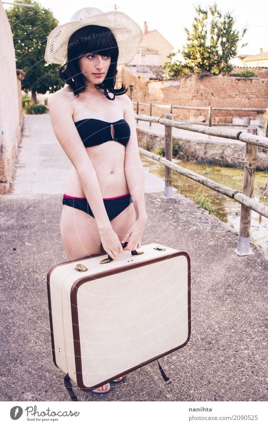 Young woman wearing a bikini and holding a suitcase Lifestyle Style Body Vacation & Travel Tourism Trip Freedom Summer Summer vacation Human being Feminine