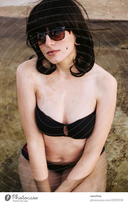 Young beautiful woman wearing a black bikini Lifestyle Elegant Style Body Vacation & Travel Trip Summer Summer vacation Sunbathing Human being Feminine