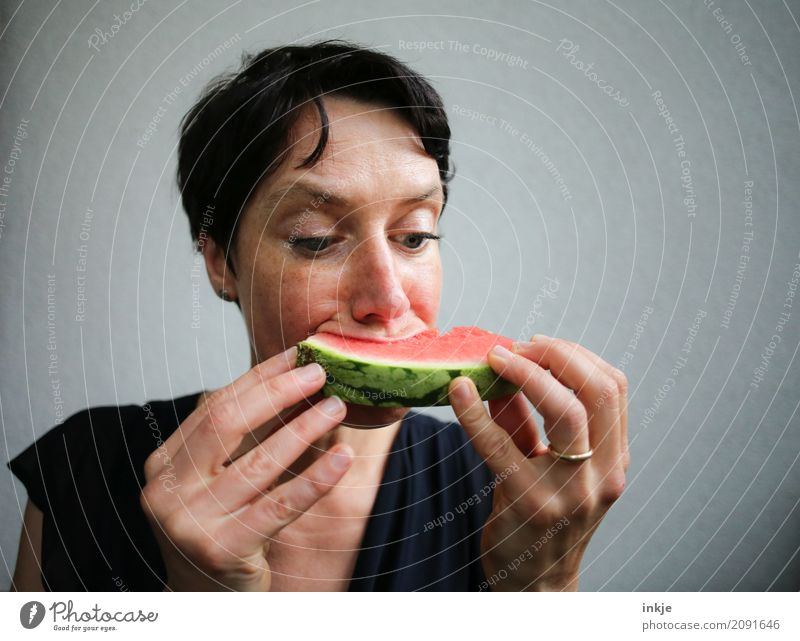 Not so beautiful looking but happy caucasian woman eating Fruit Water melon Melon Nutrition Eating Organic produce Vegetarian diet Finger food Woman Adults Life