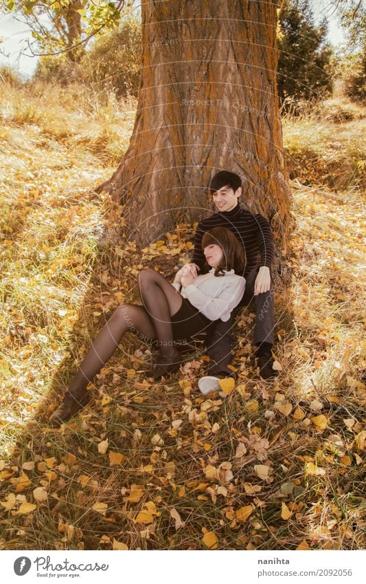 Young couple having a romantic date in a park at autumn Lifestyle Wellness Harmonious Well-being Vacation & Travel Valentine's Day Human being Masculine