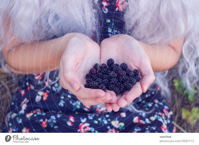 Woman holding a buntch of blackberries Food Fruit Blackberry Nutrition Organic produce Vegetarian diet Lifestyle Healthy Wellness Human being Feminine