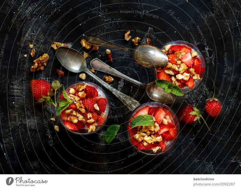 Chia pudding Strawberry parfait with greek yogurt and nuts Yoghurt Fruit Dessert Eating Breakfast Diet Glass Spoon Red White Berries Cereal chia Pudding seed