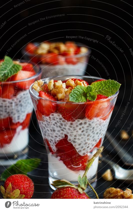 Chia pudding Strawberry parfait with greek yogurt and nuts Yoghurt Fruit Dessert Breakfast Diet Glass Spoon Red White Berries Cereal chia Pudding seed Dairy