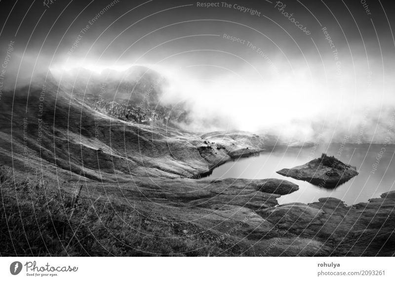 fog over alpine lake in mountains Mountain Nature Landscape Clouds Sunlight Autumn Weather Fog Meadow Hill Alps Lake Serene Alpine water Grassland Vantage point