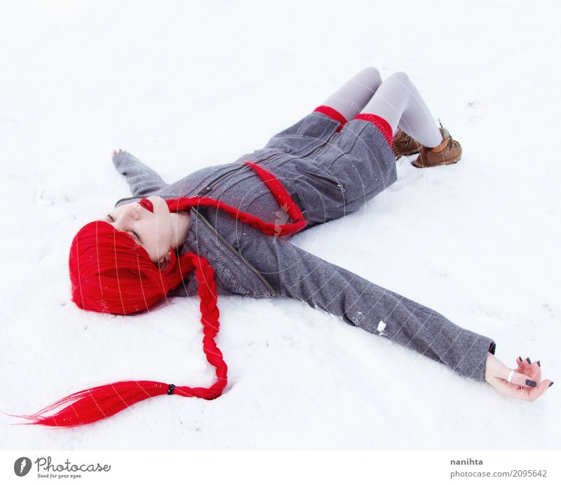 Young woman falling down in snow Human being Feminine Youth (Young adults) 1 18 - 30 years Adults Art Winter Climate Weather Snow Snowfall Coat Tights Boots