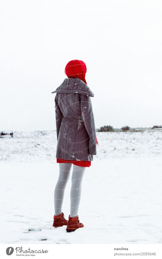 Back view of a woman waiting for something in a snowy day Elegant Style Adventure Freedom Winter Snow Human being Feminine Young woman Youth (Young adults) 1