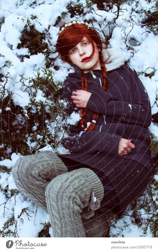 Young redhead woman lying on snow Style Human being Feminine Young woman Youth (Young adults) 1 18 - 30 years Adults Nature Plant Winter Climate Weather