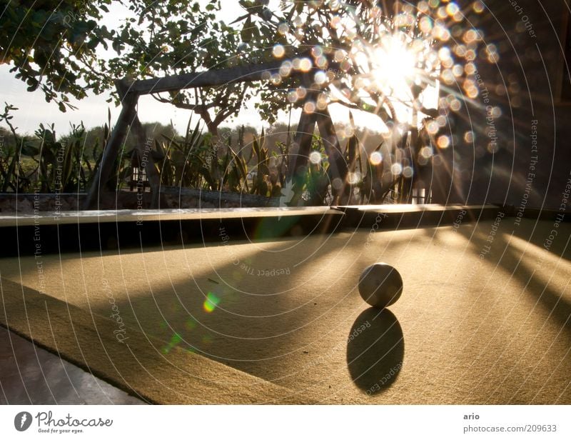 Dot and ball Pool (game) Sun Playing Bright Sphere Lens flare Colour photo Exterior shot Deserted Twilight Light (Natural Phenomenon) Billard bowle Playground