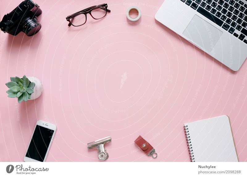 Creative flat lay of workspace desk, office stationery and lifestyle  objects on pink background with copy space - a Royalty Free Stock Photo  from Photocase