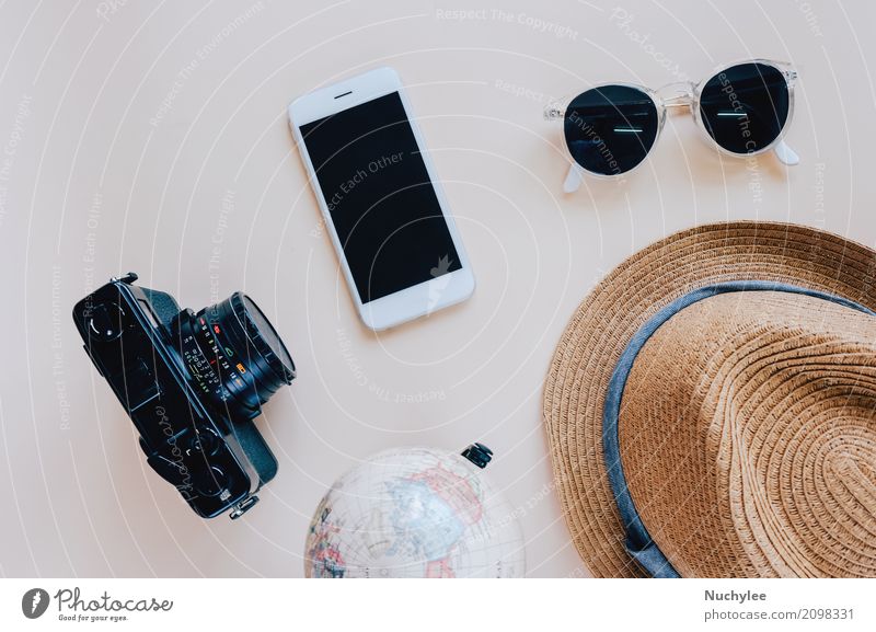 Flat lay of travel items and accessories - a Royalty Free Stock Photo from  Photocase