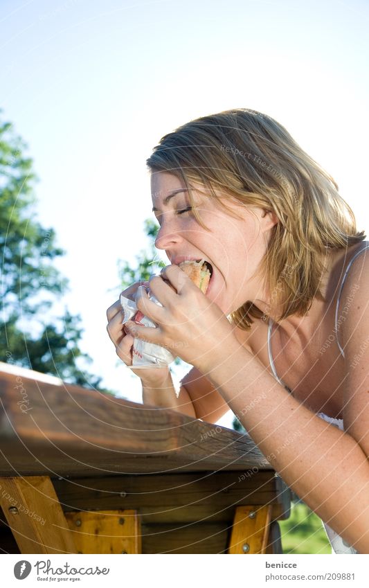 Knock yourself out! Woman Human being Thin Hamburger Nutrition Eating Kebab Roll snack Bite To enjoy Table Nature Summer Appetite Avaricious Brunch Young woman