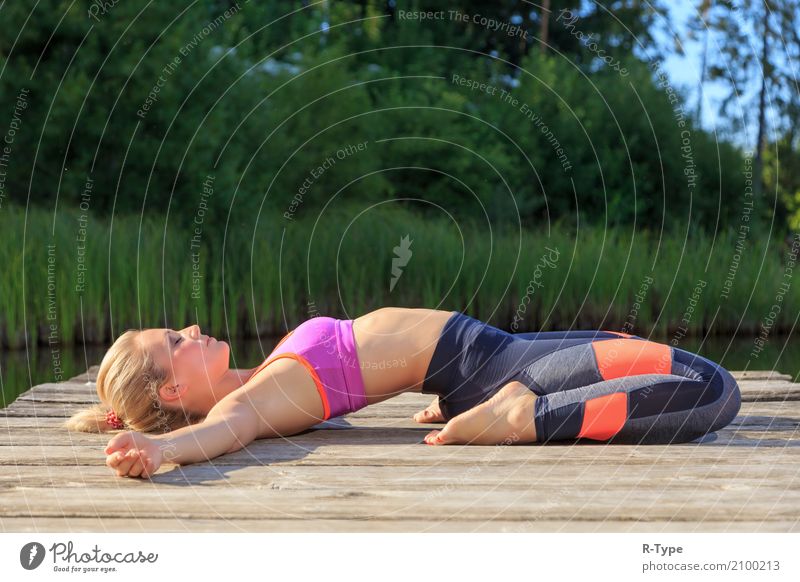 A sporty woman doing yoga and stretching exercises Lifestyle Wellness Sports Yoga Human being Woman Adults 30 - 45 years Nature Park Fashion Blonde Fitness