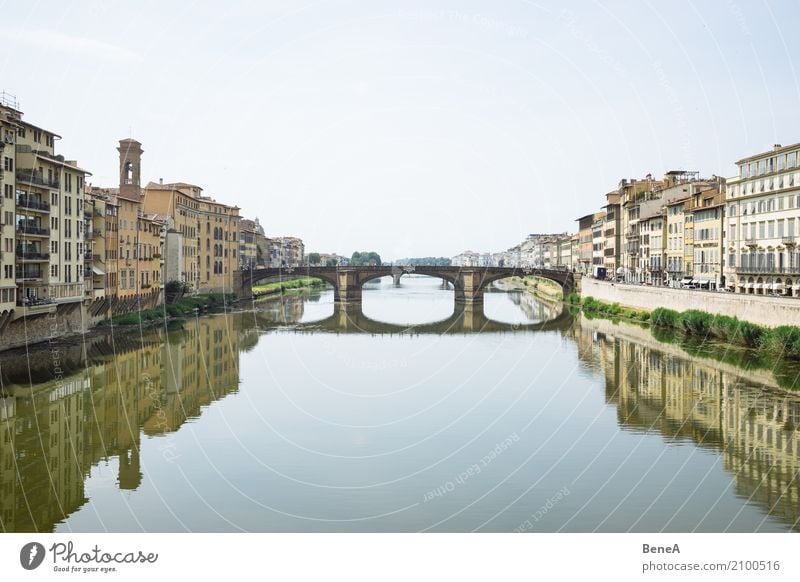 Ponte Santa Trinita in Florence reflected in the Arno River Vacation & Travel Tourism Sightseeing City trip Italy Europe Town Capital city Downtown Skyline