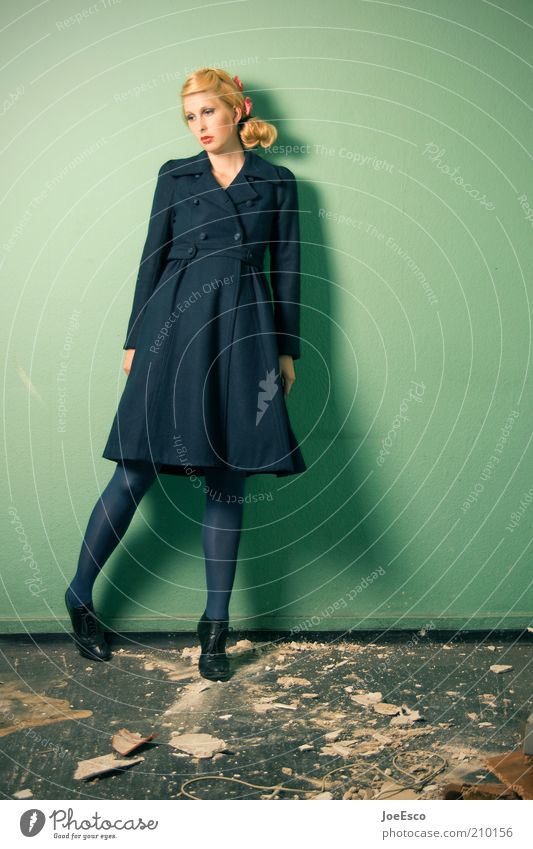 green and blue 02. Lifestyle Style Beautiful Flat (apartment) Human being Woman Adults Wall (barrier) Wall (building) Fashion Coat Tights Blonde Braids