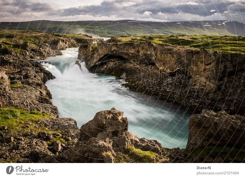 buried Environment Landscape Water Sky Clouds Summer Weather Beautiful weather Rock Canyon River bank Brook Brown Green Turquoise Iceland Waterfall Gullfoss