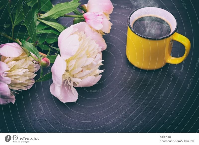 Black coffee in a yellow mug Breakfast To have a coffee Beverage Coffee Espresso Cup Table Restaurant Flower Bouquet Wood Fresh Hot Above Retro Yellow Pink