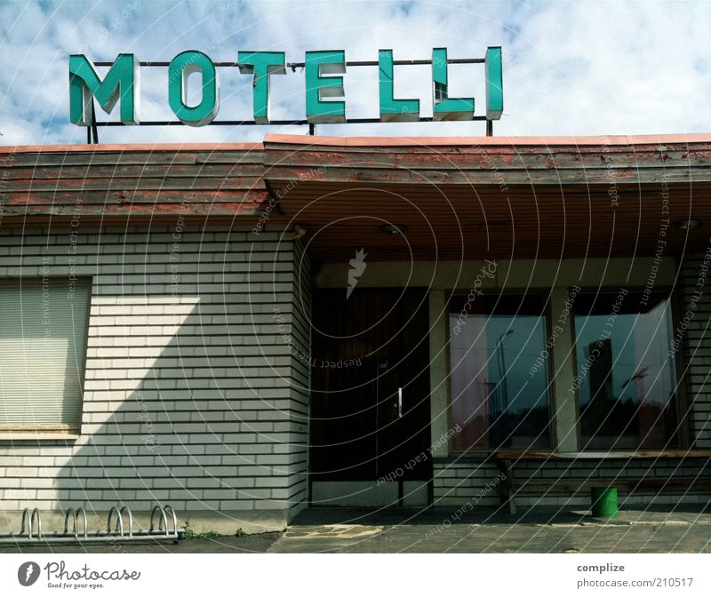 What's motel in Finnish? Vacation & Travel Tourism Summer Services Outskirts built Hotel Characters Signs and labeling Derelict Empty Motel Boarding house