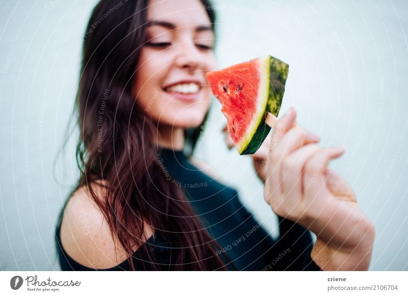 Young woman eating watermelon popsical Food Fruit Eating Diet Lifestyle Joy Healthy Eating Summer Human being Feminine Youth (Young adults) 1 18 - 30 years