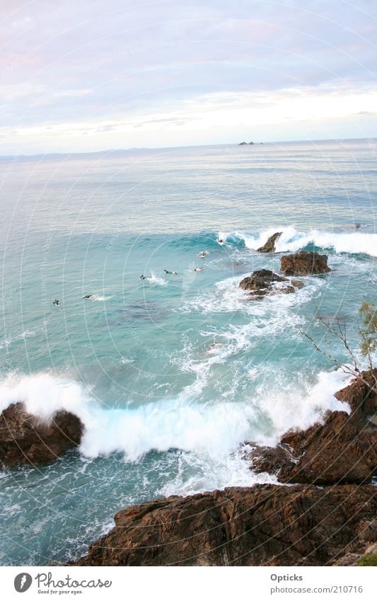 wave play Summer vacation Beach Ocean Island Waves Human being Group Earth Sand Water Clouds Coast Bay Stone Contentment Colour photo Multicoloured