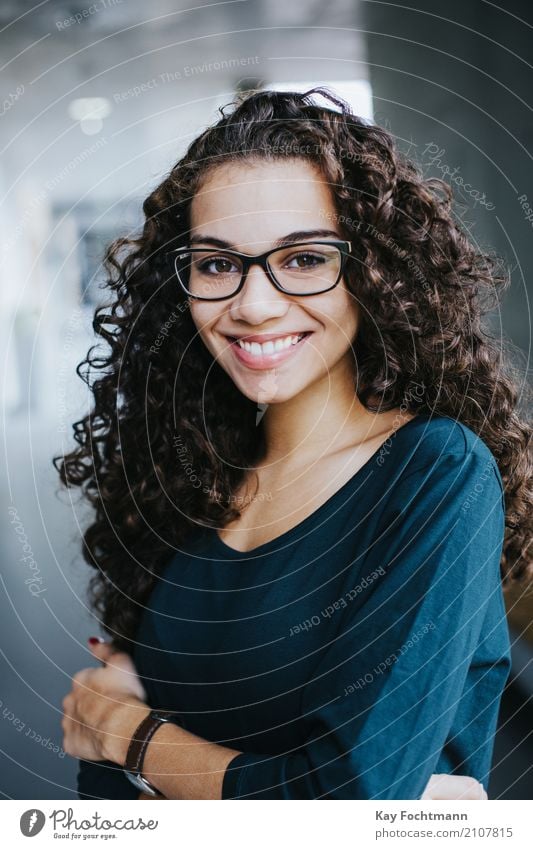 Business portrait young woman with curly hair and glasses Elegant Style Joy Happy pretty Personal hygiene Hair and hairstyles Face Wellness Harmonious