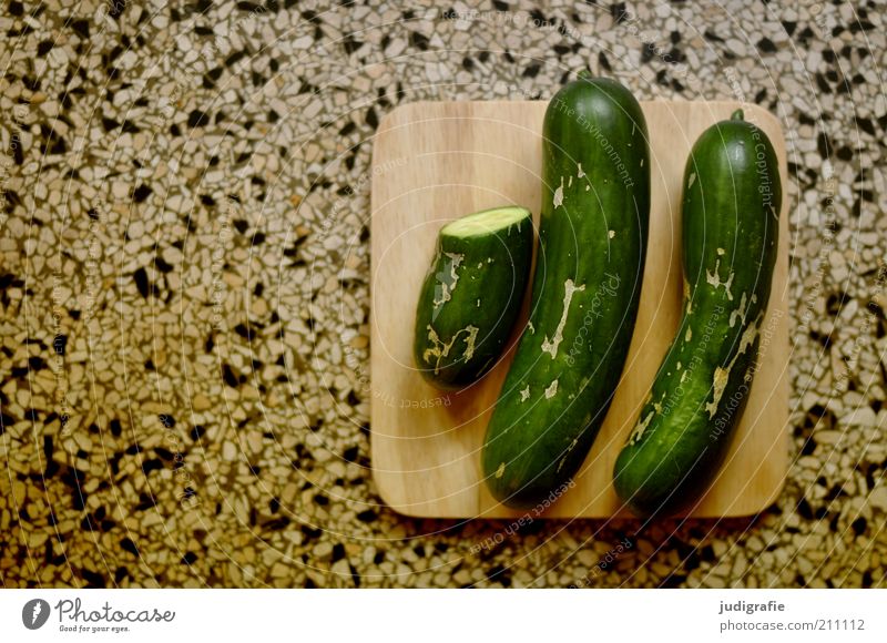 cucumbers Food Vegetable Cucumber Nutrition Organic produce Vegetarian diet Lie Delicious Healthy Eating Half 2 two and a half Wooden board terrazzo flooring