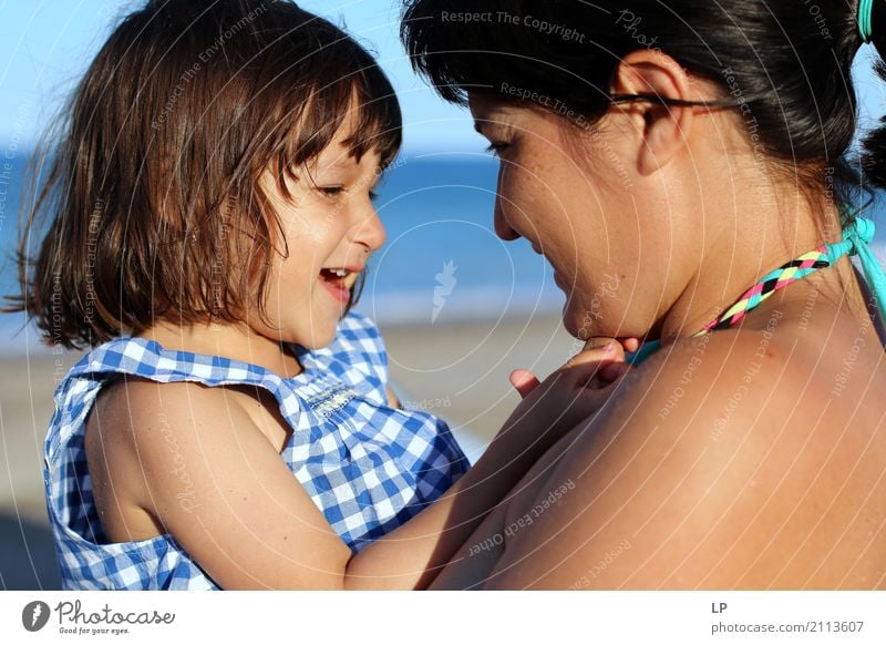 Mother and daughter laughing Well-being Leisure and hobbies Children's game Vacation & Travel Summer Summer vacation Sunbathing Beach Mother's Day Parenting