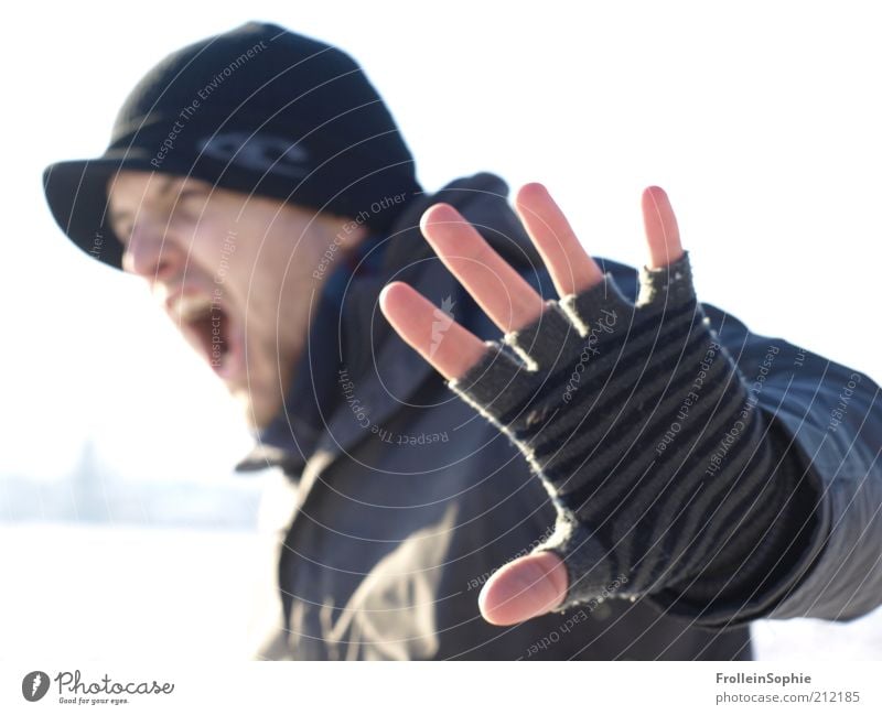 stop. Winter Human being Masculine Young man Youth (Young adults) 1 18 - 30 years Adults Snow Gloves Cap Facial hair Scream Argument Aggression Rebellious Anger