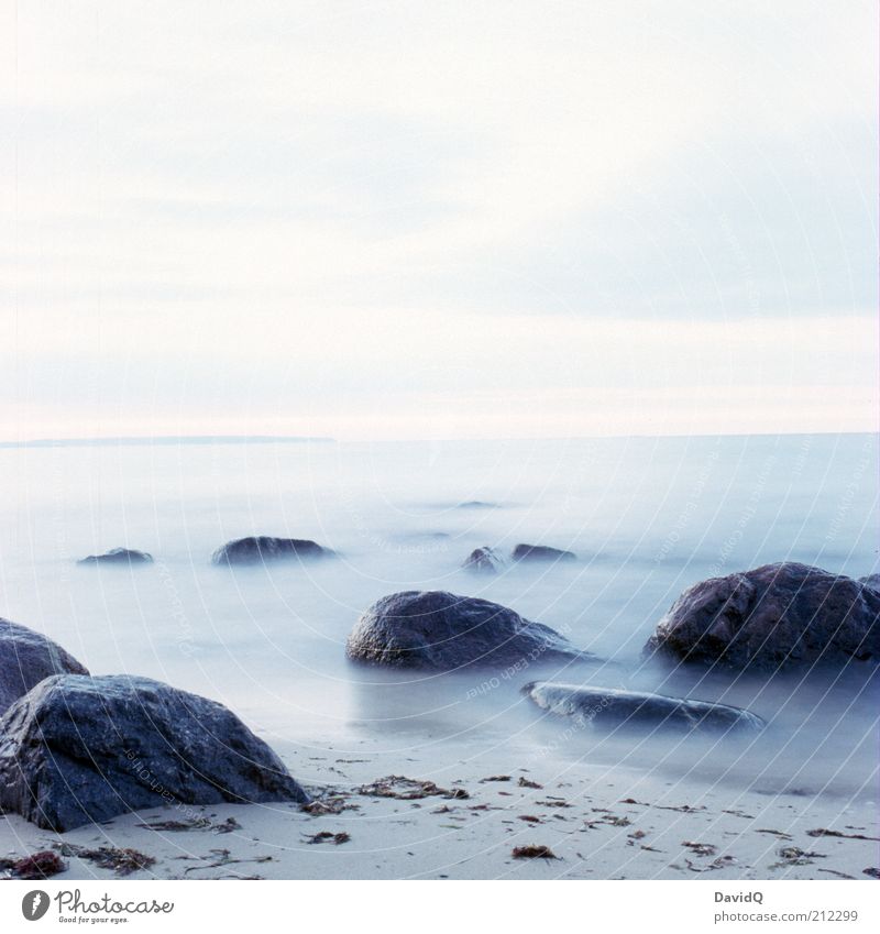 standstill Environment Nature Sky Coast Beach Baltic Sea Serene Calm Surrealism Waves Horizon Rügen Colour photo Exterior shot Deserted Copy Space top Evening