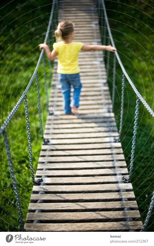 Crossing bridges Leisure and hobbies Playing Playground Human being Child Toddler Girl Infancy Back Legs 1 1 - 3 years Jeans Suspension bridge Wooden bridge