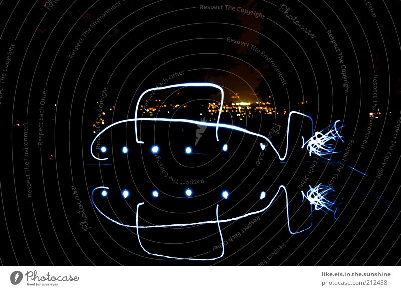look, honey, a light art submarine! Night sky Town Outskirts Glittering Draw Esthetic Exceptional Large Uniqueness Joy Horizon Idea Innovative Visual spectacle