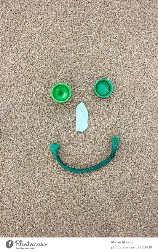 Recyling is good for the environment. Smiley figure made of plastic garbage. Sand Beach Make Happy Sustainability Green Virtuous Responsibility Help Inspiration