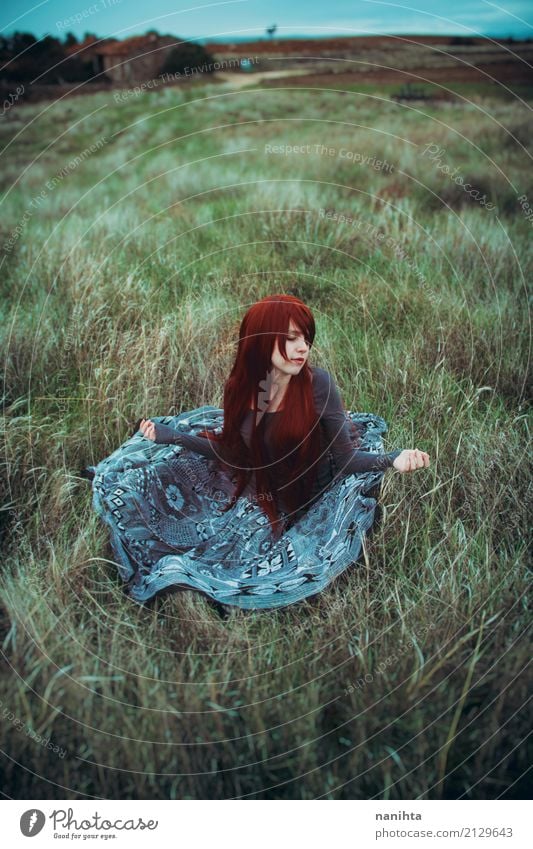 Young redhead woman sitting in a field Human being Feminine Young woman Youth (Young adults) 1 18 - 30 years Adults Environment Nature Landscape Spring Autumn