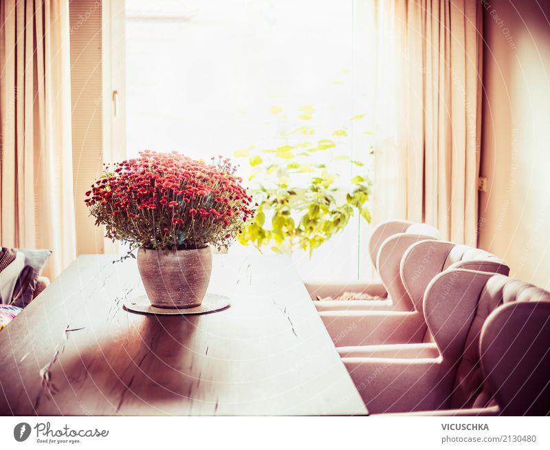 Dining Room With Table And Bunch Of Flowers A Royalty Free Stock Photo From Photocase