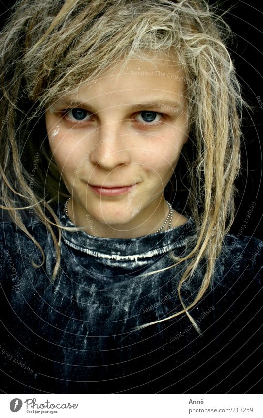 mesmeric Feminine Hair and hairstyles Eyes T-shirt Dreadlocks Looking Black Power Self-confident Resolve Smiling Subdued colour Interior shot Experimental
