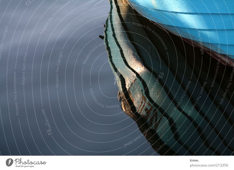 just lie around Watercraft boat wall Turquoise Reflection Wet Damp Exterior shot Deserted Lie Shadow Sun Groove Structures and shapes Surface of water
