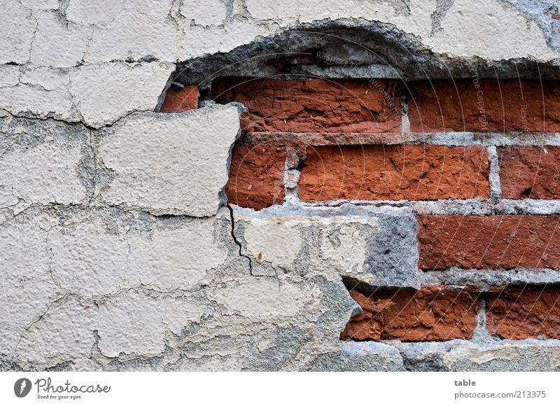 breakup Wall (barrier) Wall (building) Facade Stone Concrete Old Sharp-edged Broken Gray Red Apocalyptic sentiment Decline Past Transience Plaster