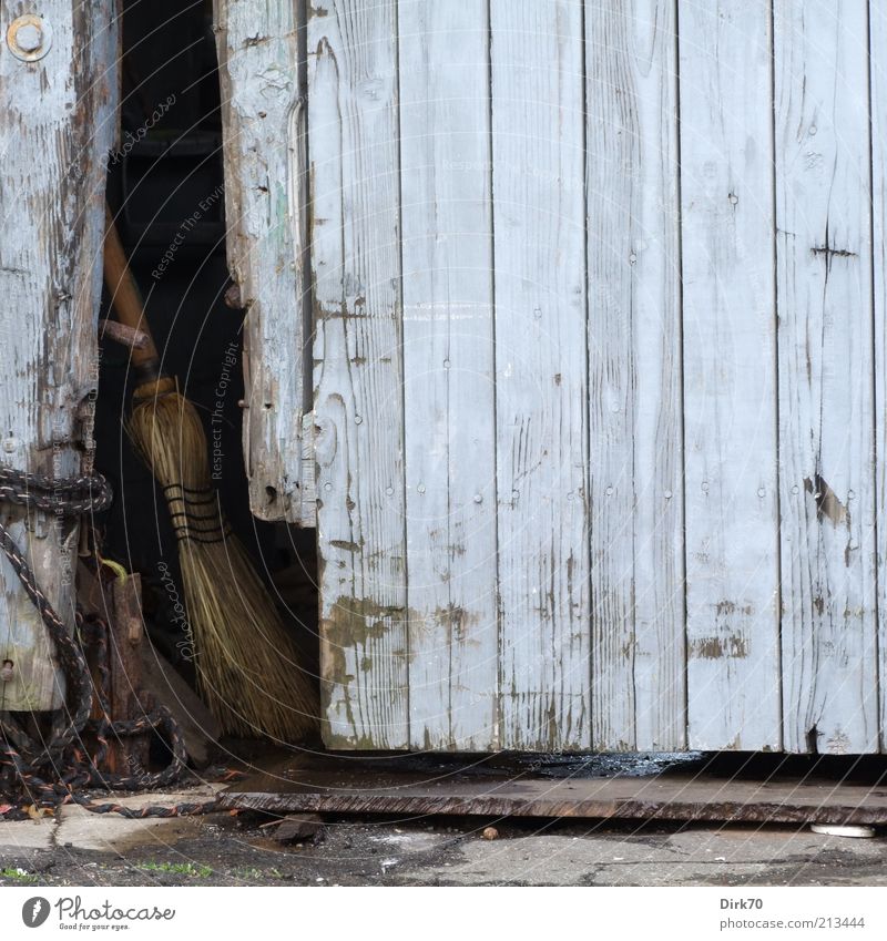 Broom parked Manmade structures Building Storage shed Door Wood Entrance Main gate Access Dirty Dark Simple Blue Gray Disregard Calm Stagnating Moody Decline