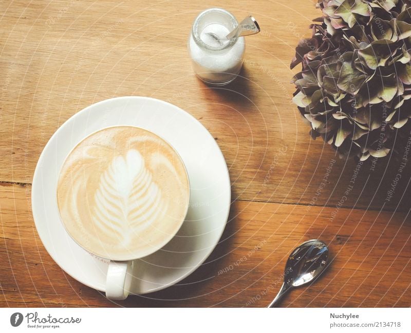 https://www.photocase.com/photos/2134718-cappuccino-or-latte-coffee-on-table-breakfast-photocase-stock-photo-large.jpeg