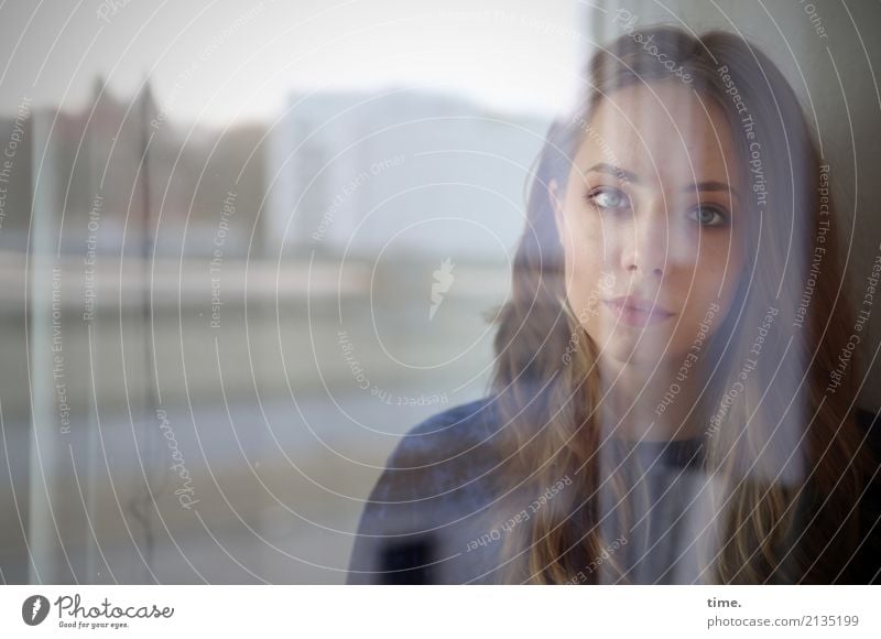 young woman at the window Feminine Woman Adults 1 Human being House (Residential Structure) Window Sweater Blonde Long-haired Observe Think Looking Wait Dark