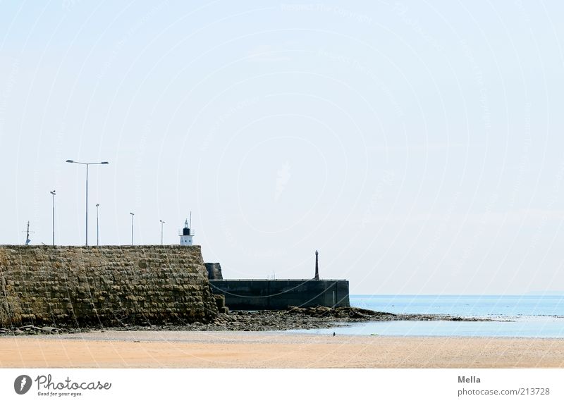 deserted Vacation & Travel Trip Beach Ocean Environment Landscape Sand Water Cloudless sky Beautiful weather Coast Mole Wall (barrier) Wall (building) Lamp