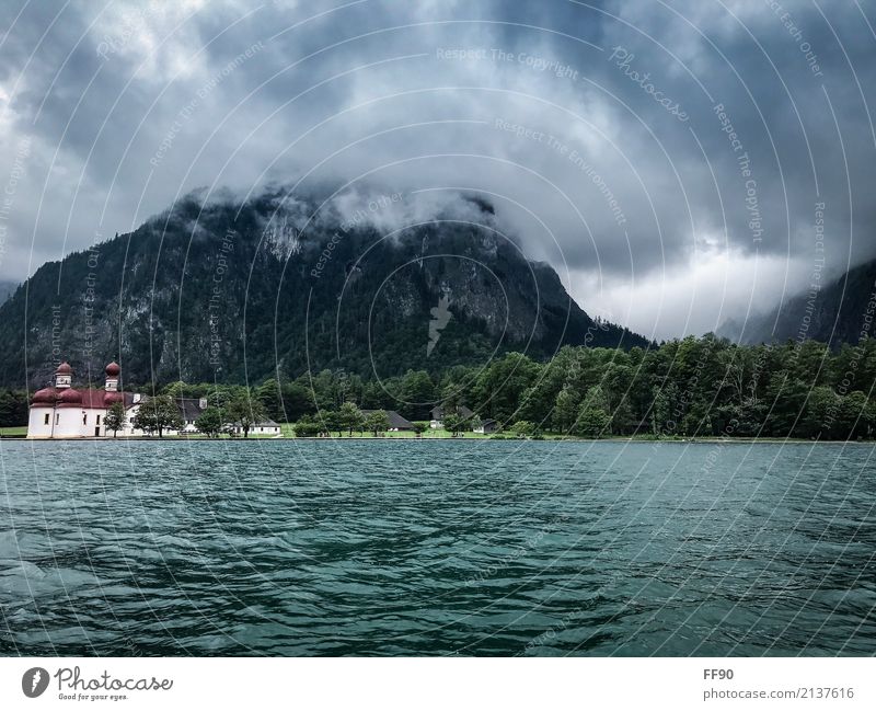 Epic King Lake Sky Clouds Bad weather Storm Rock Alps Mountain Peak Lakeside Lake Königssee St. Bartholomä Village Church Navigation Boating trip On board