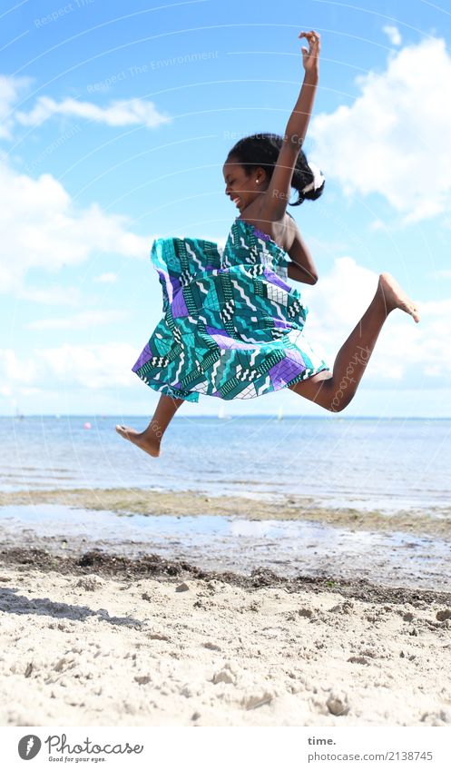 Float over the beach in a party mood. Feminine Girl 1 Human being Sand Coast Beach Baltic Sea Dress Black-haired Long-haired Flying Jump Beautiful Joy
