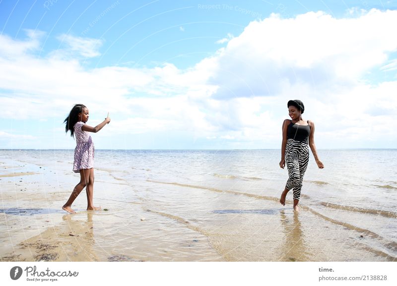 Gloria and Arabella Feminine Woman Adults 1 Human being Water Sky Clouds Beautiful weather Waves Coast Beach Baltic Sea Dress Black-haired Long-haired Observe