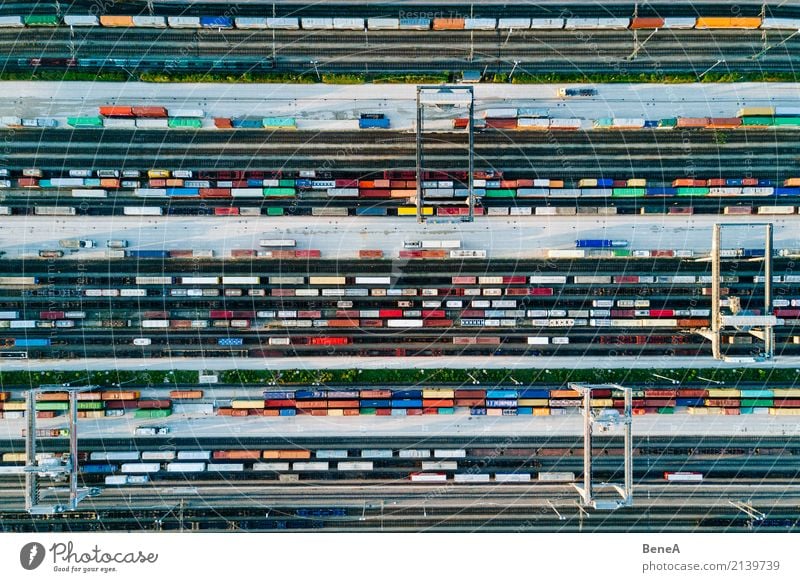 Freight trains and colorful containers in a logistics station Economy Industry Trade Logistics Business Technology Advancement Future Transport