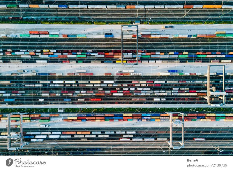 Freight trains and colorful containers in a logistics station Economy Industry Trade Logistics Business Technology Advancement Future Transport