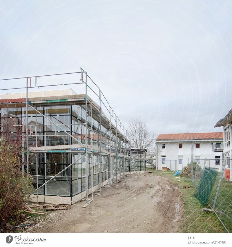 construction site Sky House (Residential Structure) Manmade structures Building Architecture Construction site Facade Window Scaffold Modern New Colour photo